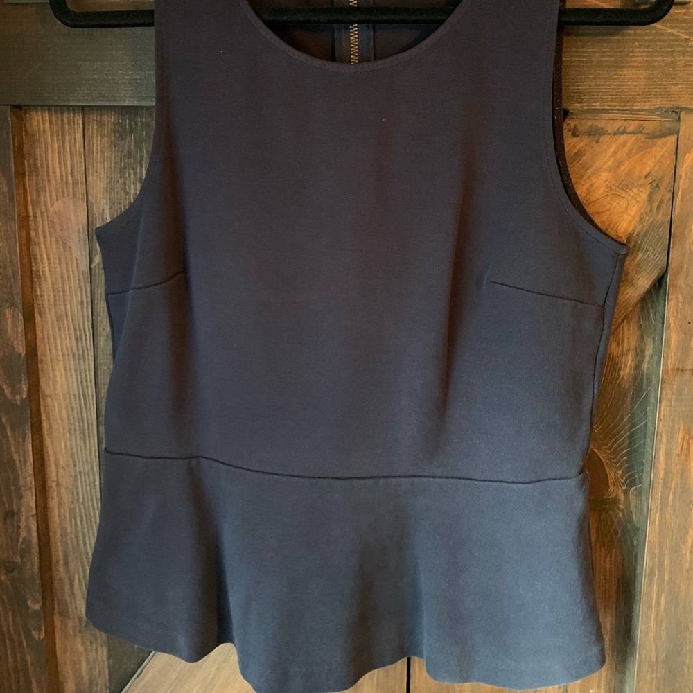 Navy peplum sleeveless top